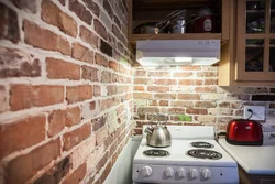 Kitchen interior with bricks on the wall