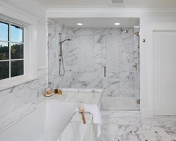 Bathroom with marble tiles photo