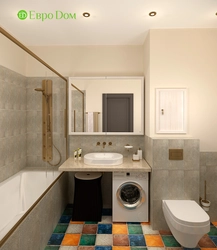 Bathroom interior with small bathtub and washing machine