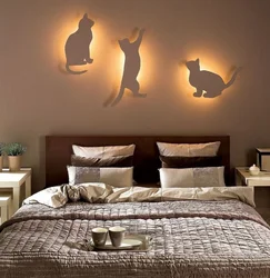 Wall decor above the bed in the bedroom photo