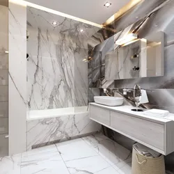 Small bathroom in marble tiles photo