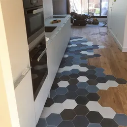 Laminate and tiles in the kitchen photo combined flooring