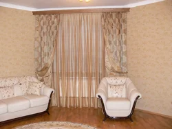 Design of curtains for the living room on the ceiling cornice