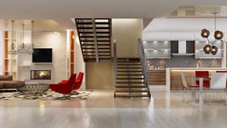 Kitchen in a house with stairs to the second floor design photo