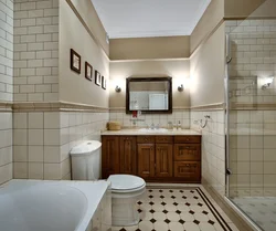 Laying tiles on a bathtub photo