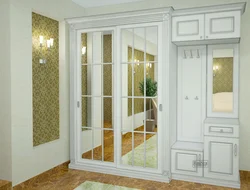 Mirrored wardrobe in the hallway design