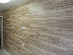 Renovation of kitchen walls with laminate photo