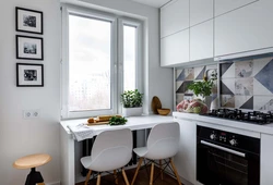 Photo of a small kitchen by the window