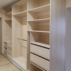 Hallway design in an apartment with a wardrobe photo in light colors