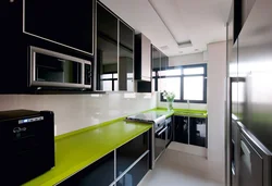 Зеленая столешница в интерьере кухни