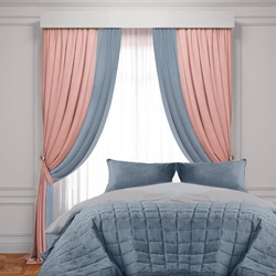 Blue curtains in the bedroom interior