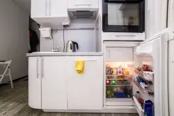 Kitchen design with refrigerator and freezer