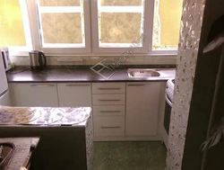 Kitchen On The Balcony In A One-Room Apartment Photo