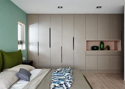 Built-in wardrobe in the bedroom interior photo