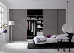 Bedroom design with white wardrobe