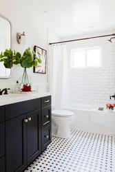 Small bathroom design with white tiles