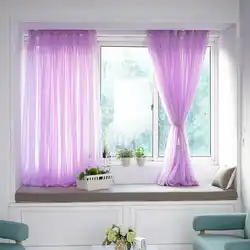Tulle up to the window sill in a modern bedroom photo