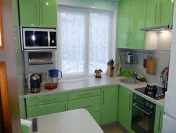 Design of a small corner kitchen with a window
