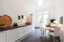 Photo Of A Kitchen Without Upper Cabinets In Style