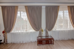 Curtains For Two Windows With A Wall Photo In A Modern Living Room