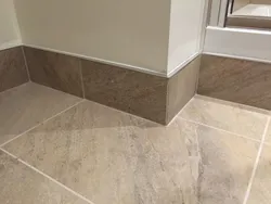 Plinth for bathtub made of tiles photo