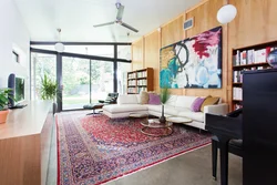 Bedroom interior with carpet on the wall photo