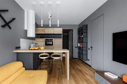 Kitchen area in a studio apartment photo