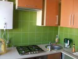 Kitchen 6 sq m with gas water heater and refrigerator photo