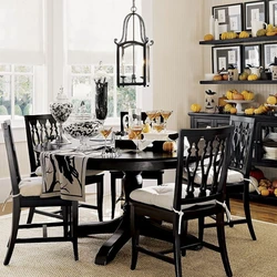 Black chairs in the kitchen interior photo