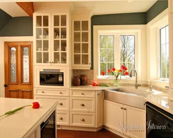 Kitchen with stove in a country house design photo