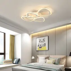 Design of lamps on a suspended ceiling in the bedroom