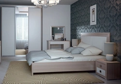 Дизайн спальни с серой кроватью и шкафом