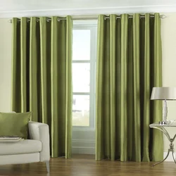 What kind of curtains will suit green wallpaper in the living room? photo