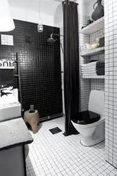 Black and white bathroom with shower photo