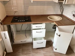 Kitchen design 6 square meters with a refrigerator in Khrushchev