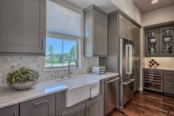 Design of a modern bright kitchen with a window