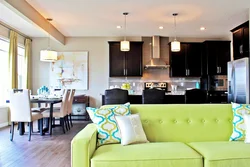 Green sofa in the kitchen interior