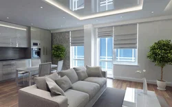 Photo kitchen living room in a house with panoramic windows