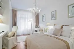 Beige curtains in the bedroom interior