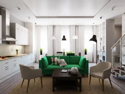 Green Kitchen In The Interior With Living Room Design