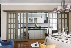 Plasterboard partitions for zoning the kitchen and living room with your own photos