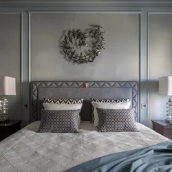 Bedroom with moldings on the walls in a modern interior