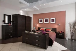 Bedroom interior design with dark furniture