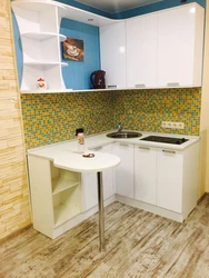 Corner kitchens in a studio apartment photo