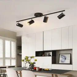 Трековые светильники в интерьере кухни гостиной