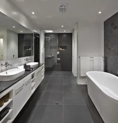 Bathroom design with gray tiles on the floor