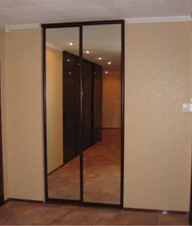 Wardrobe In The Hallway With A Mirror Photo
