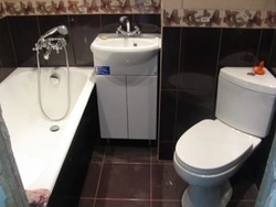 Bathroom with corner toilet photo