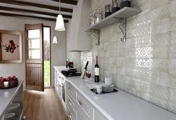 Tiles on kitchen walls photo in the interior