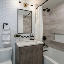 Gray bathroom interior with wood